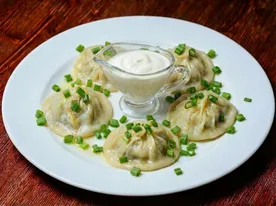 Манты с рубленой говядиной и луком